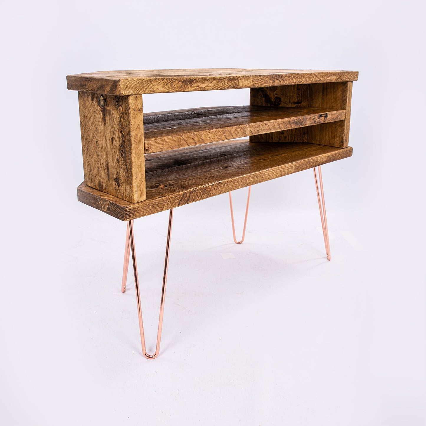 Corner TV & Display Stand - Handmade Bespoke Wooden Unit with rose gold coloured legs. Corner angle view
