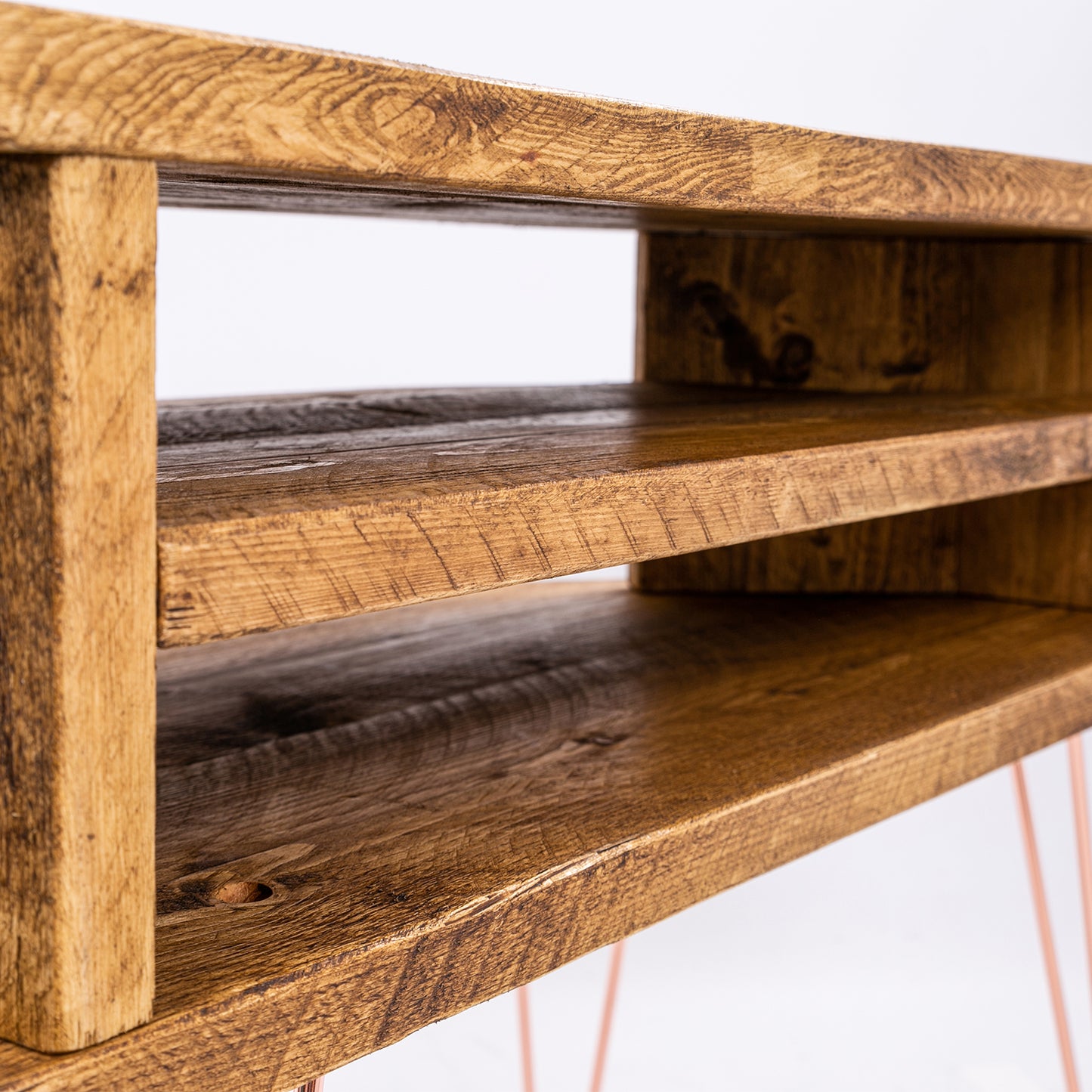 Corner TV & Display Stand - Handmade Bespoke Wooden Unit with rose gold coloured legs. Close up