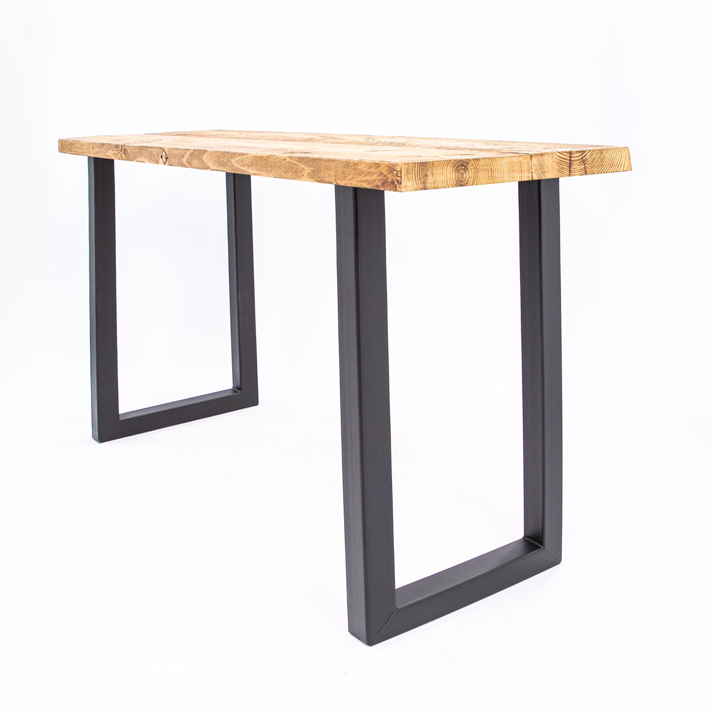 Handmade wooden table with black steel legs. Corner angle view