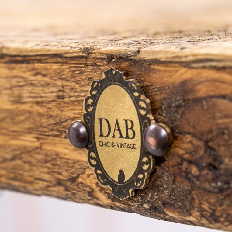 Rose Gold Desk. Close up of badge