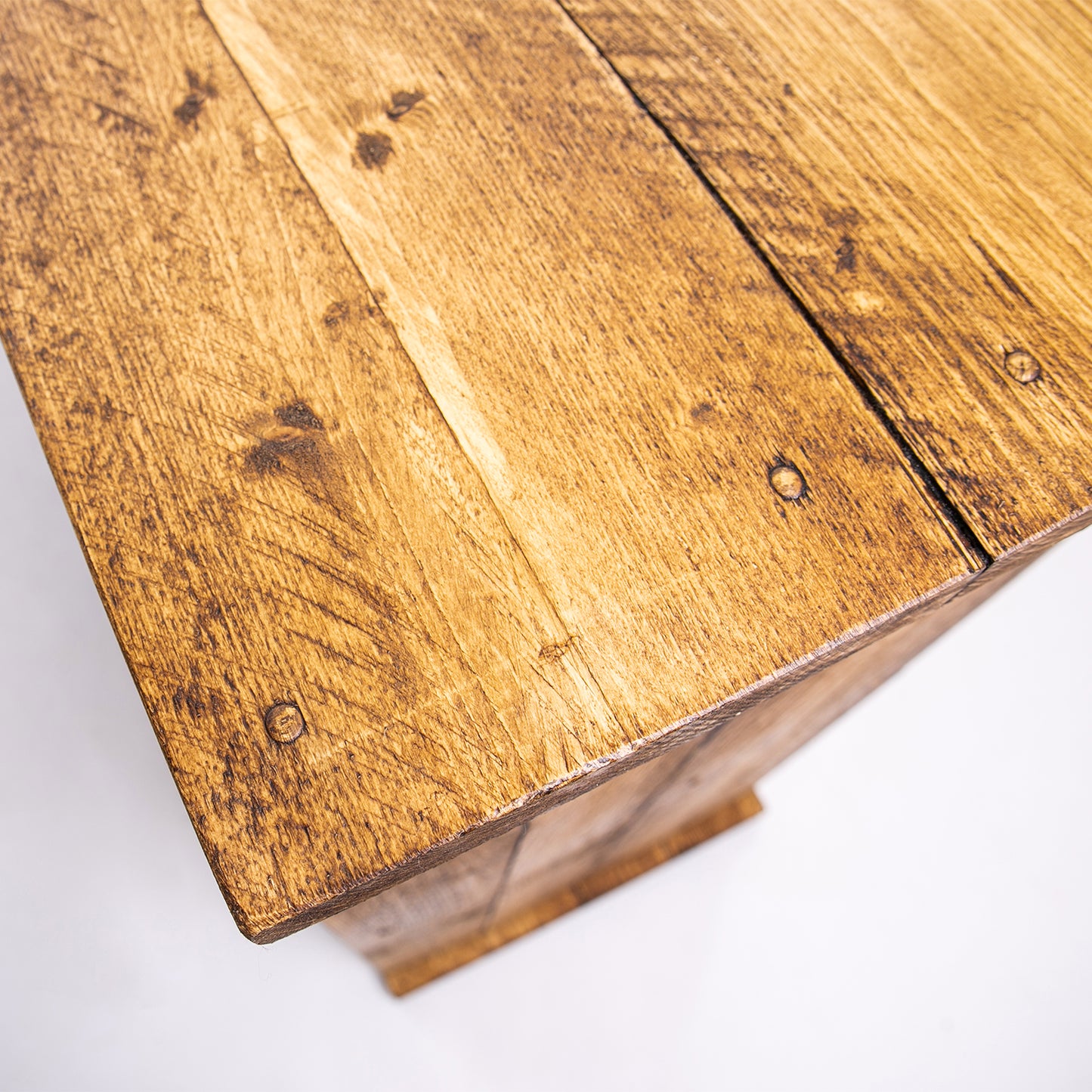 DAB wooden sideboard in old pine finish. Close up of top corner