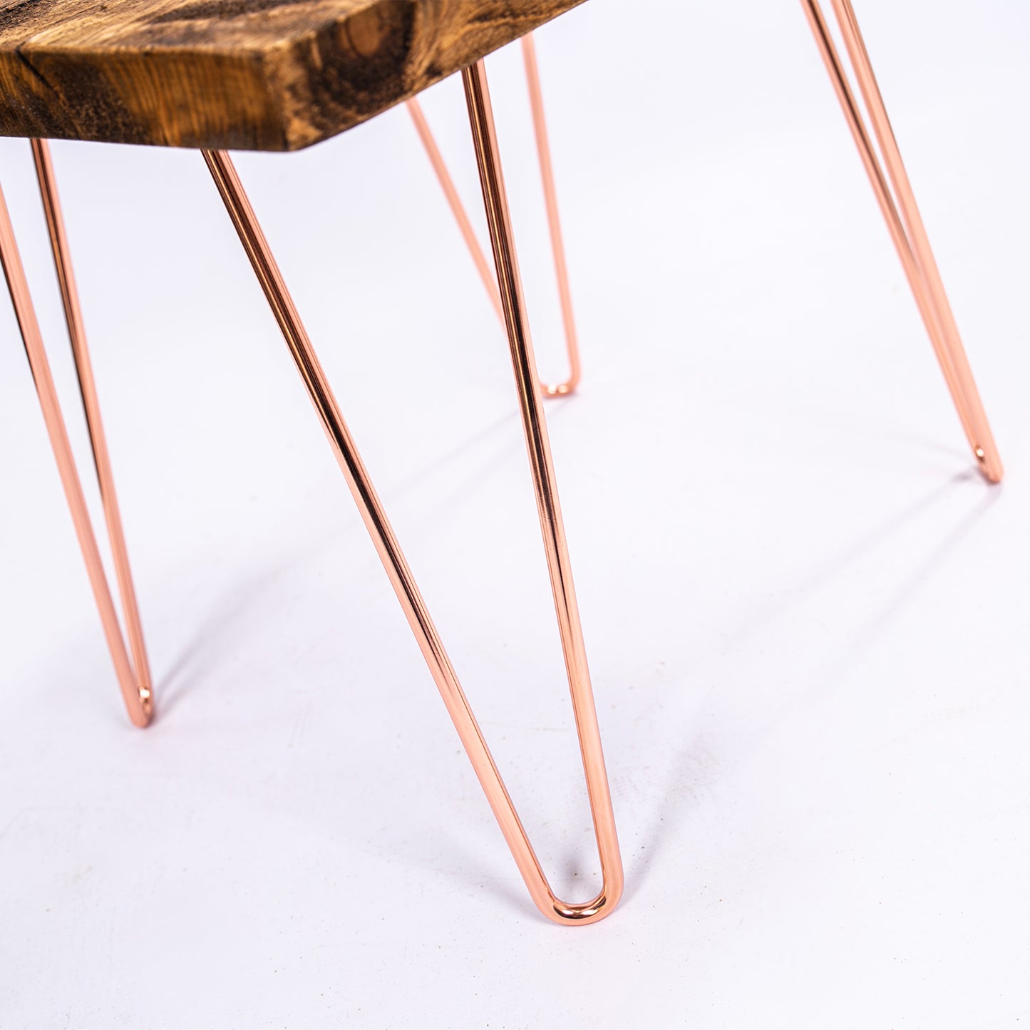 Steel Hairpin Bar Stool. Close up of rose gold legs