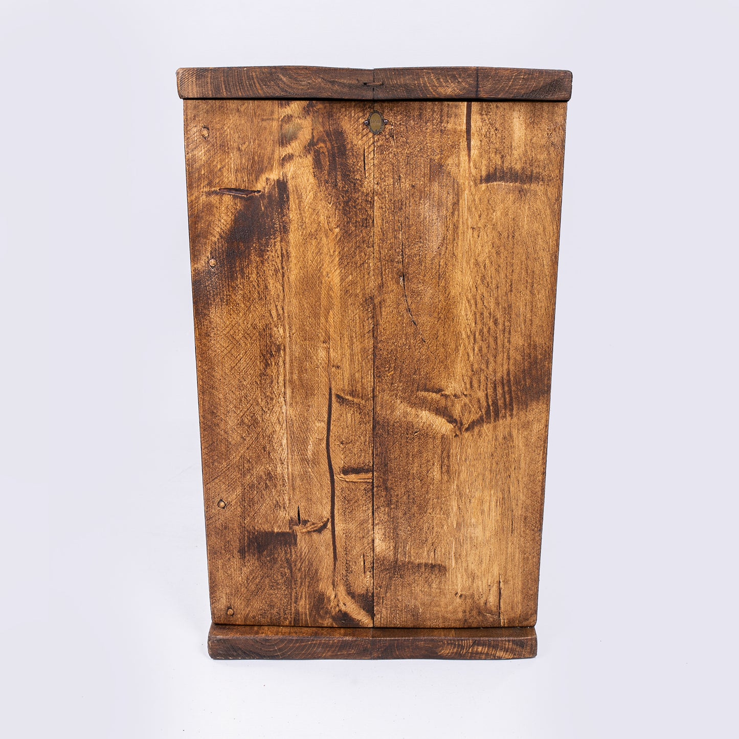 Wooden bedroom drawer set by DAB. Rustic finish with badge on show. Left side view photo