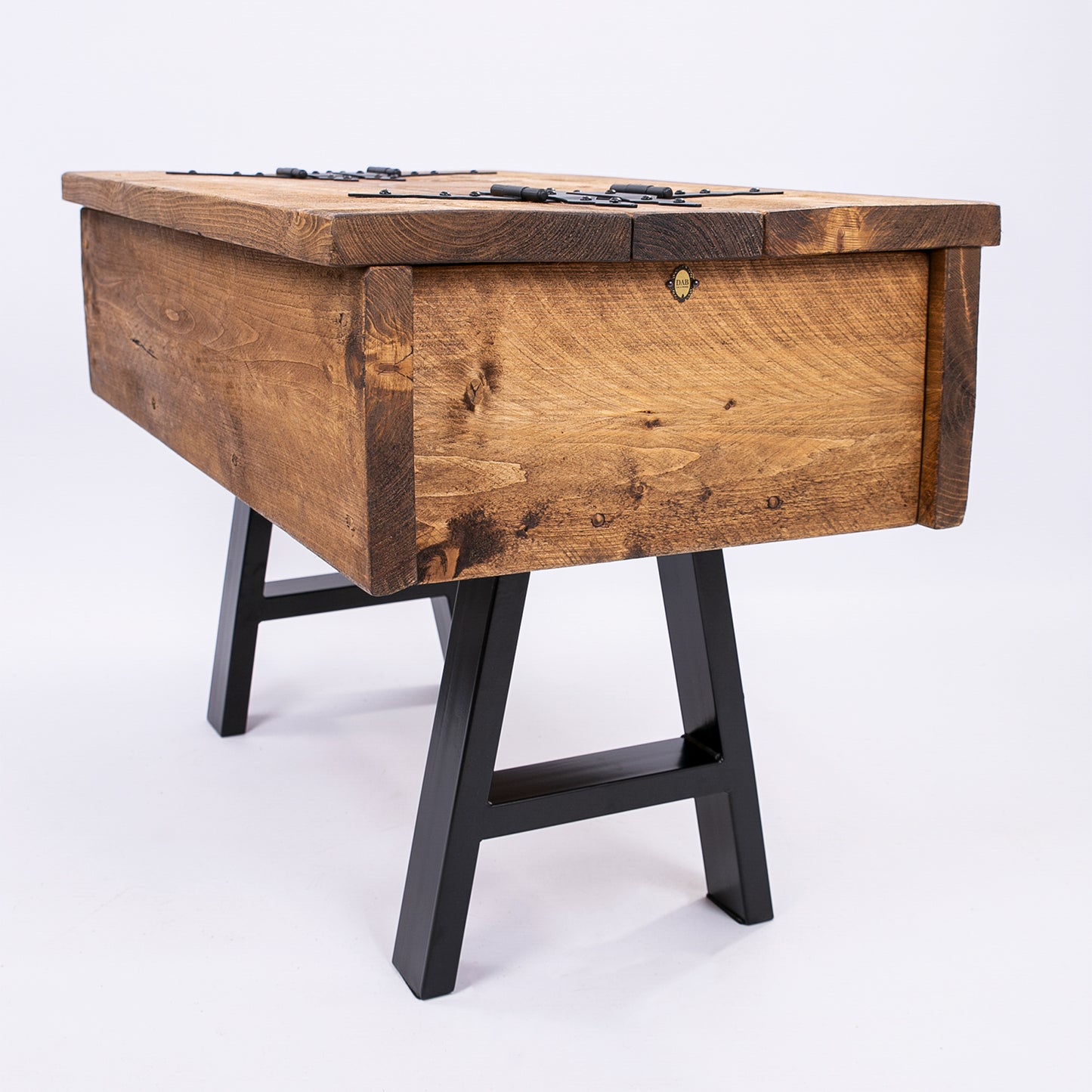 Wooden Blanket Box with Storage with black steelwork legs. Corner view