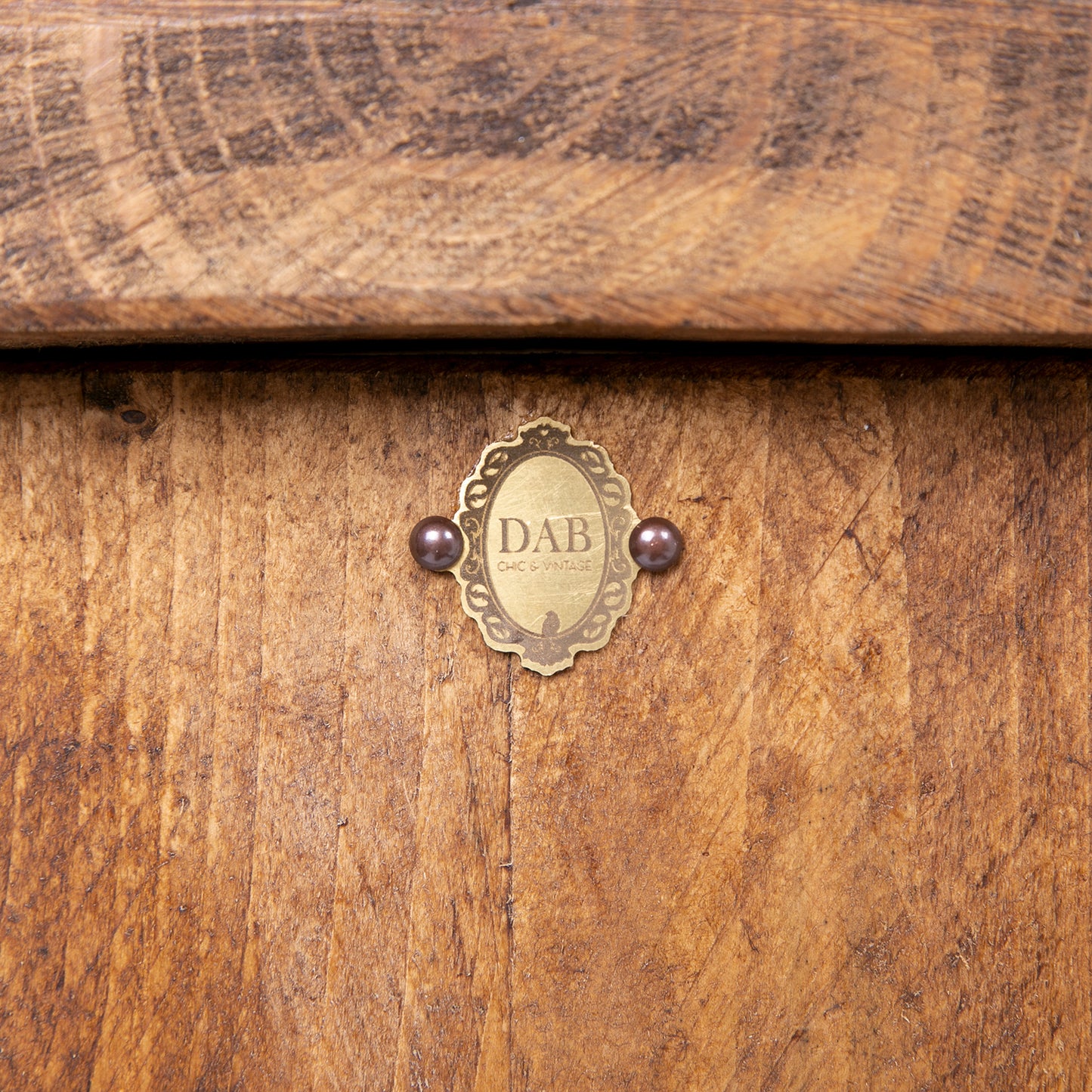 Wooden Corner TV Unit. Close up badge