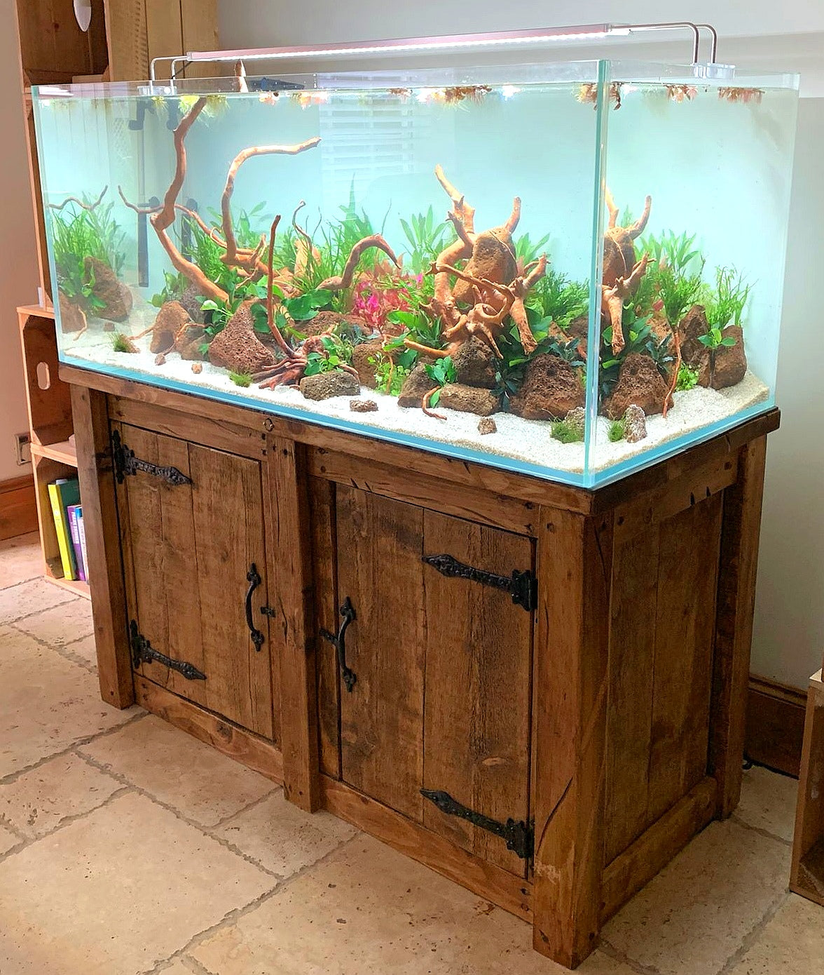 A solid wooden fish tank stand with great storage space. Both bespoke and handmade by DAB Chic & Vintage