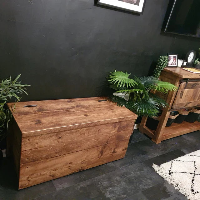 Wooden storage bench with a rustic pine woodwax finish. A spacious design which was handmade and delivered by our team at DAB Chic & Vintage