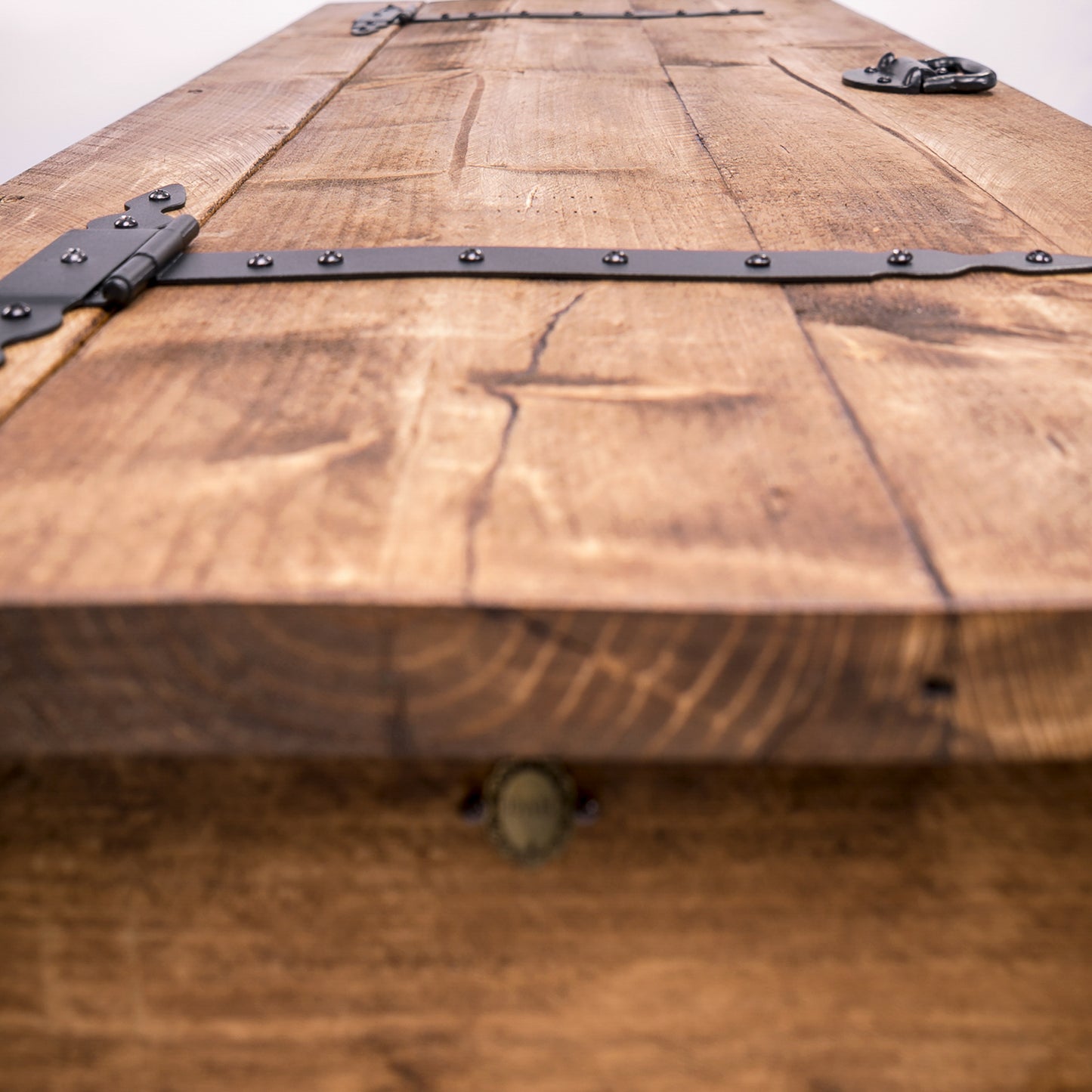 Bespoke Wooden Blanket Box with steelwork handles and hinges. Side view