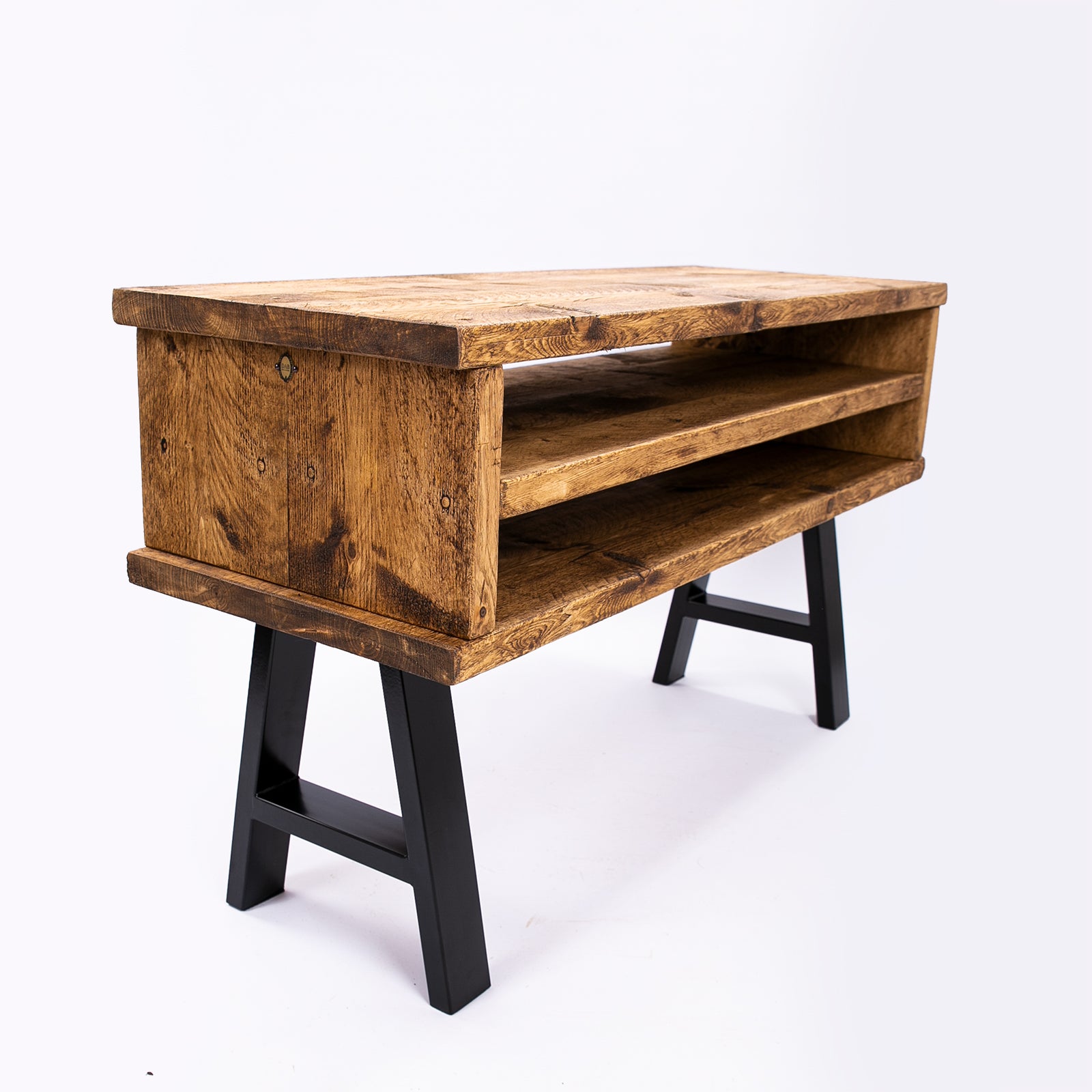 Handmade rustic TV stand with black metal legs. Side angle view