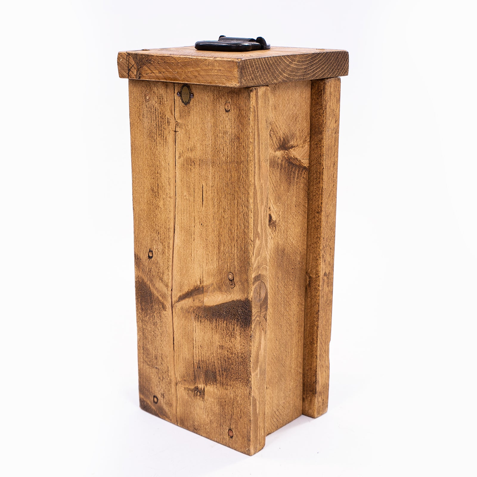 Heavy duty doorstop. Side angle photo with handle and badge on show