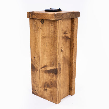 Heavy duty doorstop. Side angle photo with handle and badge on show
