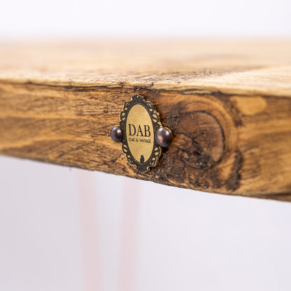 Rose Gold Desk. Close up of badge