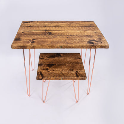 Rose gold work desk seat. Hairpin steel legs and wooden worktops. Front facing view