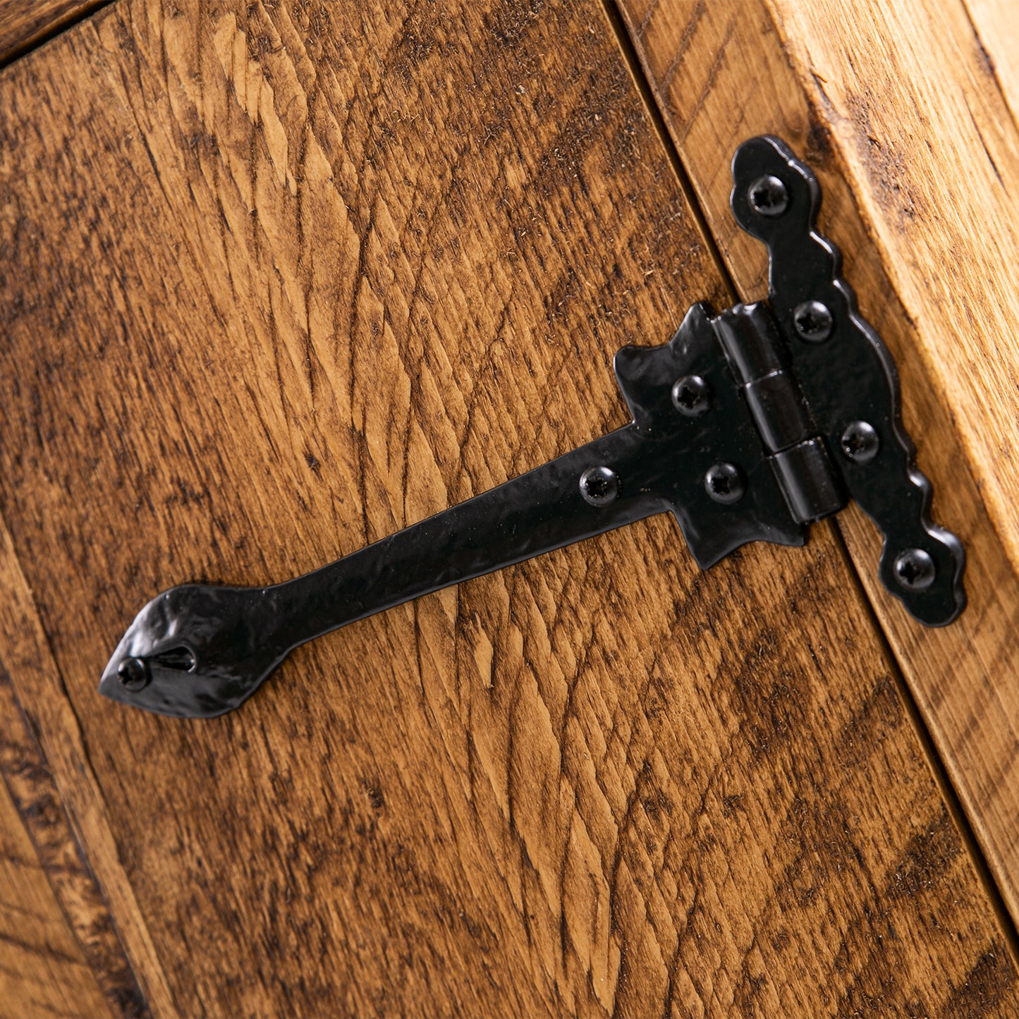 Rustic Wooden Sideboard. Close up of decorative vintage hinges