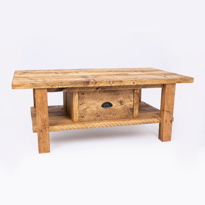 Solid wooden coffee table with drawers. Front view